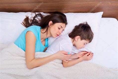 mom son sez|Mother And Son Sleeping In Bed stock videos and footage.